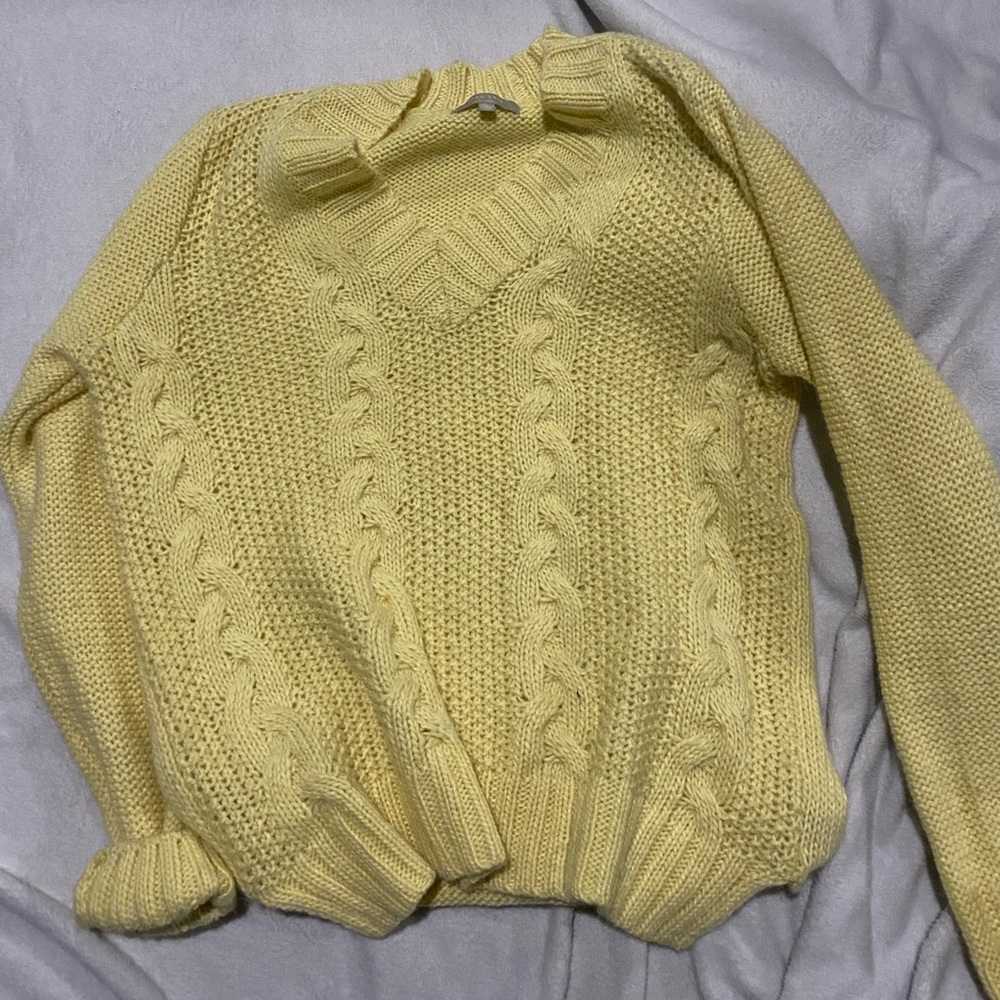 yellow knitted sweater